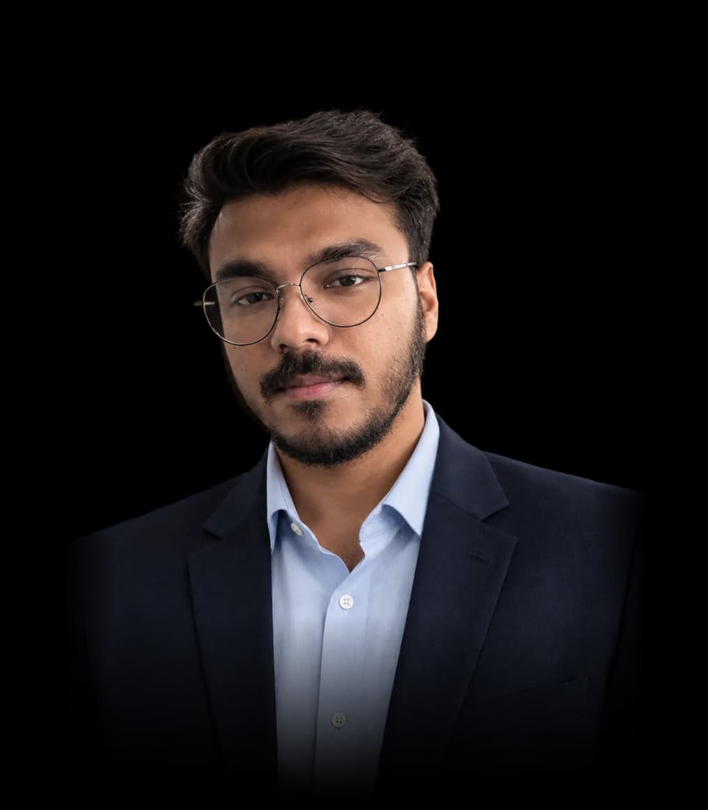 Krishnendu Ghosal in a navy blazer and light blue shirt